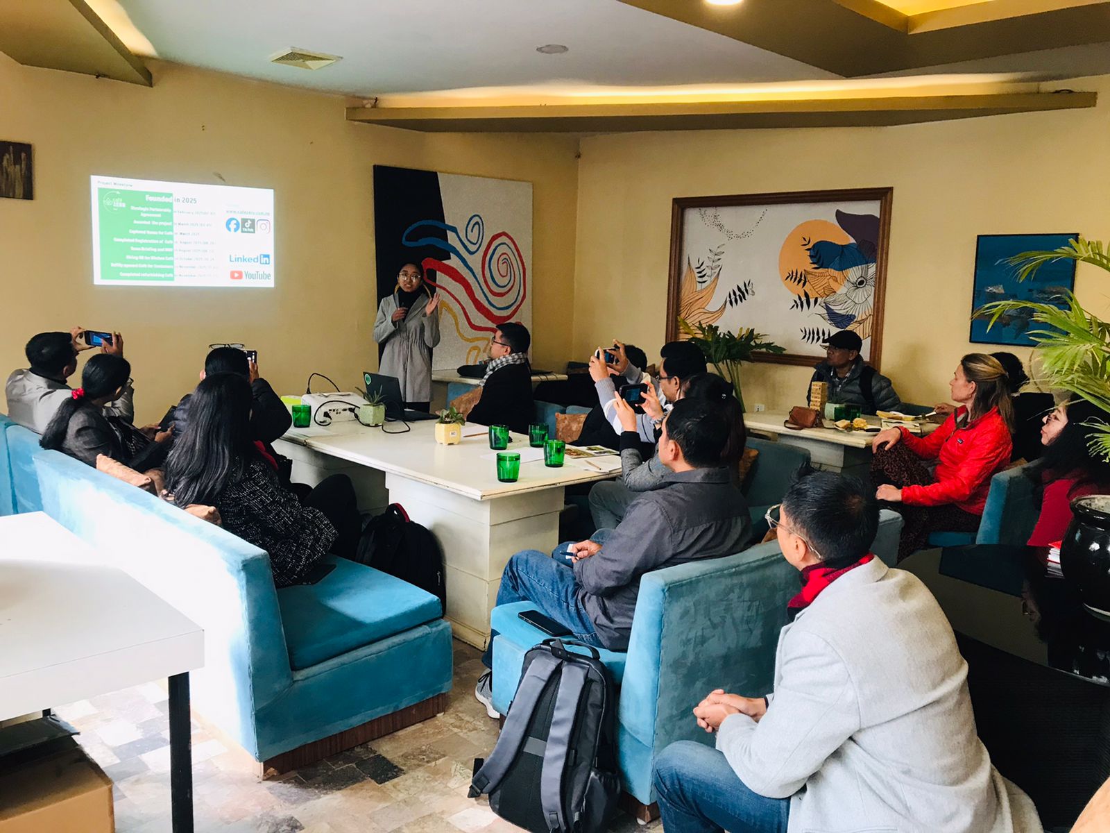 Exchange Knowledge Learning and Sharing session at Café Zero with professionals from different nations.